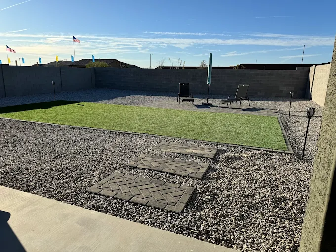 Modern Arizona backyard with pavers and turf installed by White Tanks Landscaping